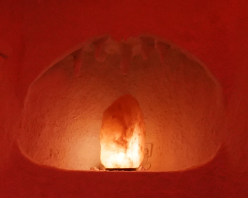 Peaceful salt cave atmosphere with calming blue ambient lighting